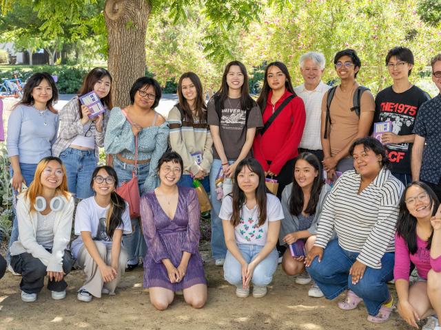 A posed picture of the attendees of one of the Aggie Arts Committee's events.
